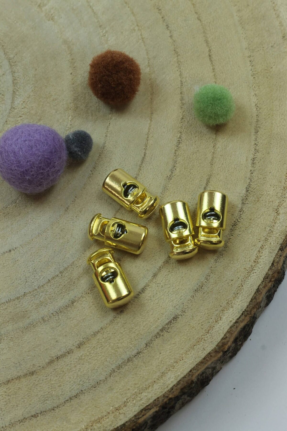 Kordelstopper metallisiert gold