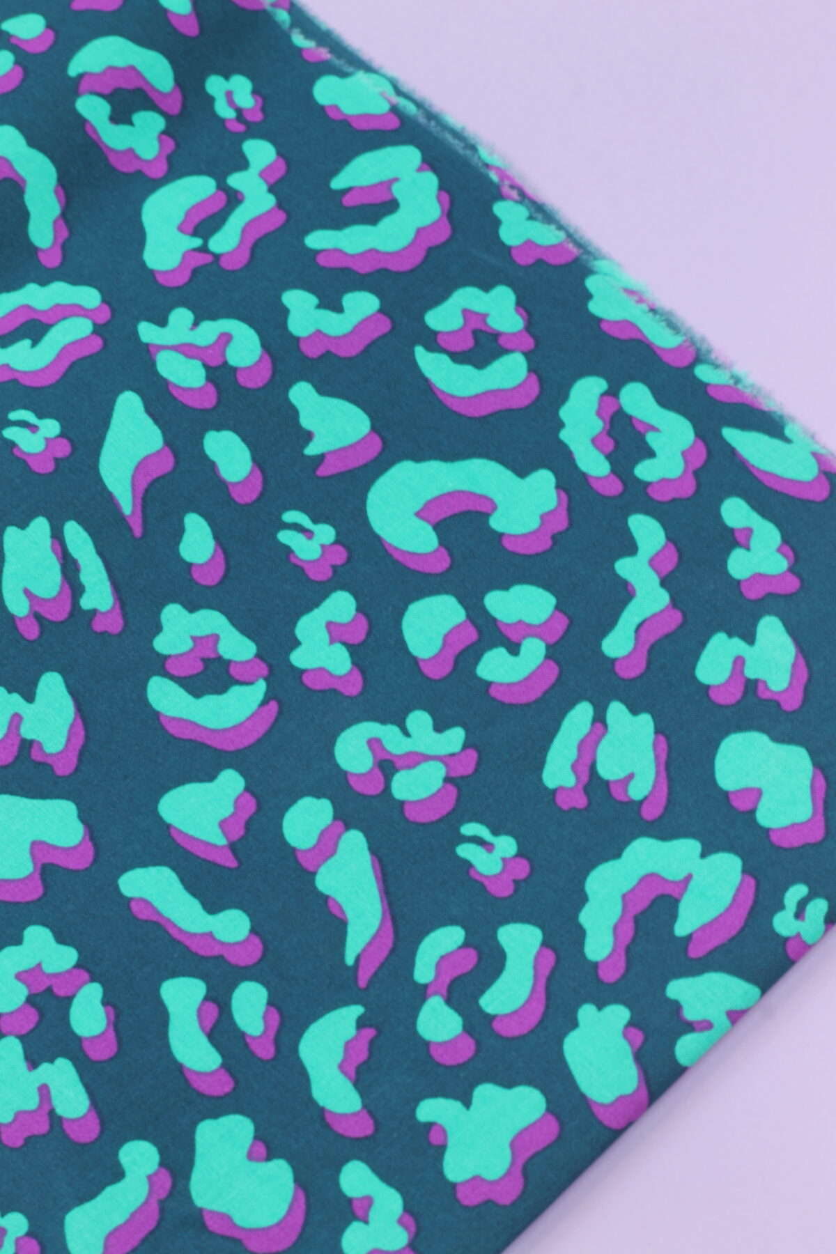 Wachstuch "Leo Dark Green/Purple/Green"